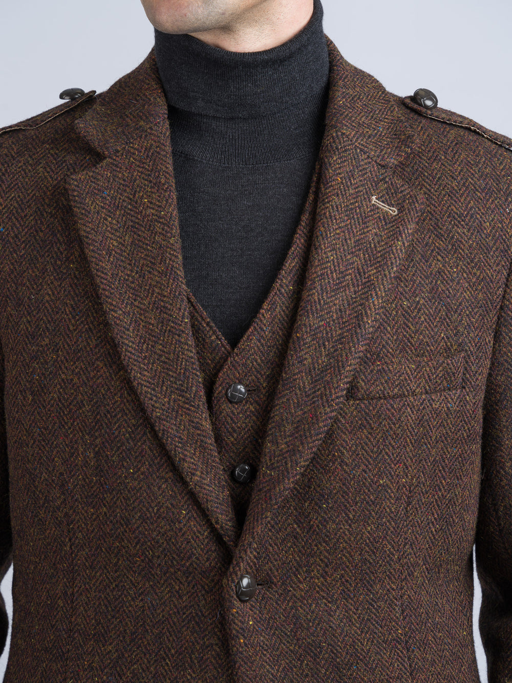 Braune Tweedjacke mit Fischgrätenmuster